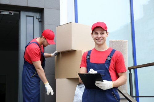 Careful loading of boxes during student removals in Mayfair