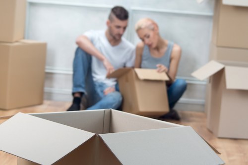 Professional movers loading furniture for urgent relocation in Mayfair