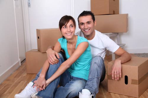 Packed moving boxes and furniture prepared for relocation in Mayfair