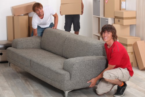 Careful packing of fragile items during a Mayfair removals process