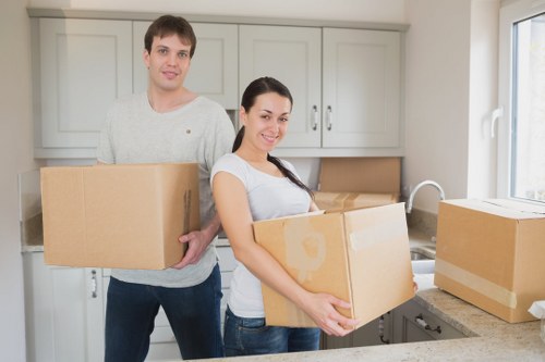 Careful loading of furniture into a moving van in Mayfair